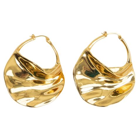 celine swirl hoop earrings|Celine.